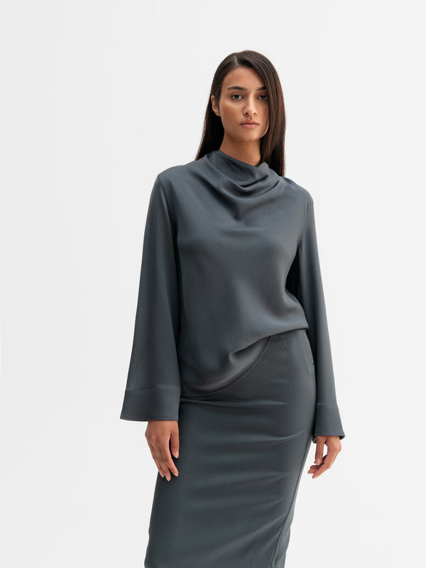 Model wearing Ahlvar Gallery Ari blouse in Dark grey