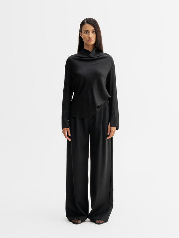 Model wearing Ahlvar Gallery Ayumi silk blouse in Black