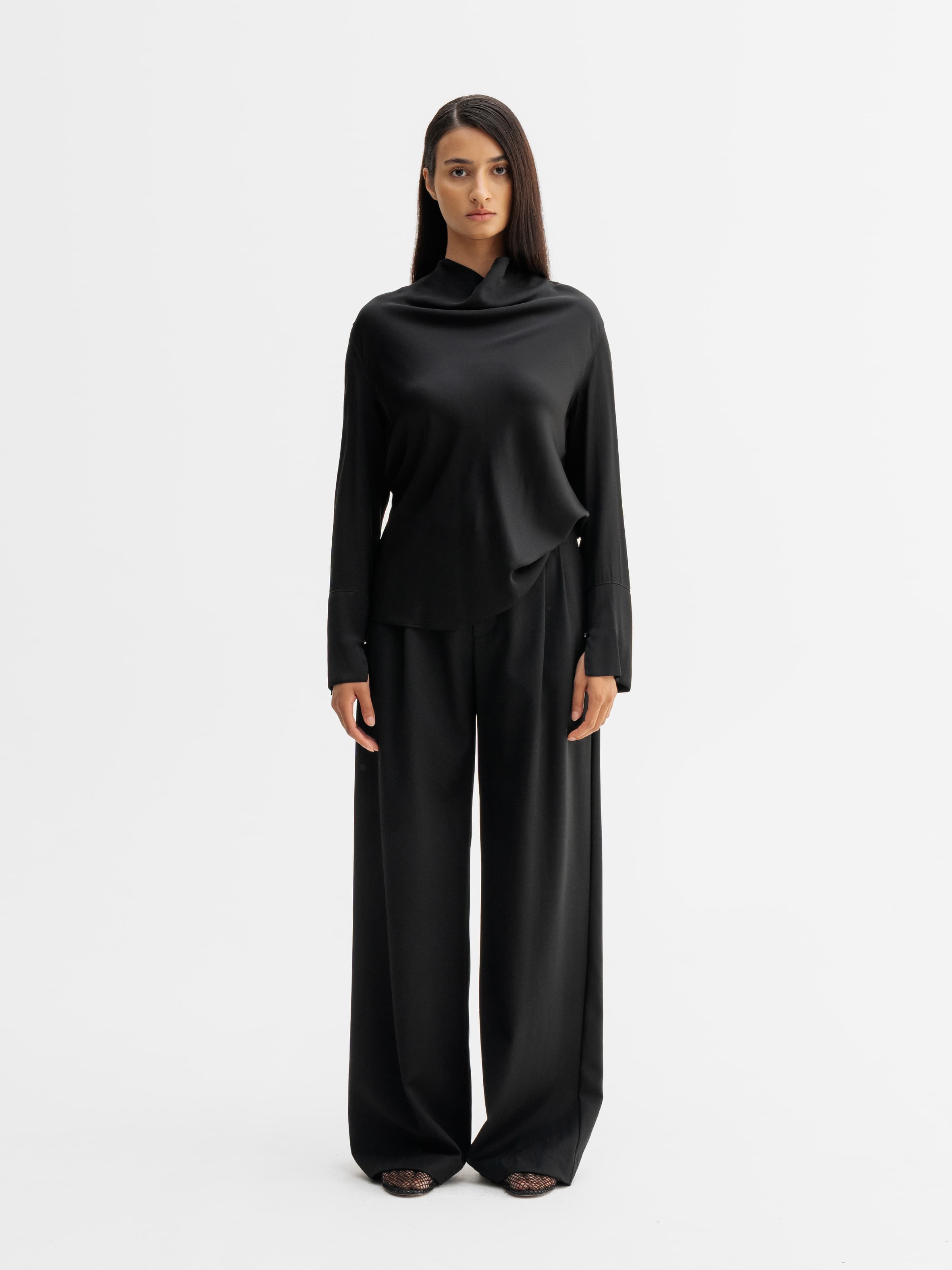 Model wearing Ahlvar Gallery Ayumi silk blouse in Black
