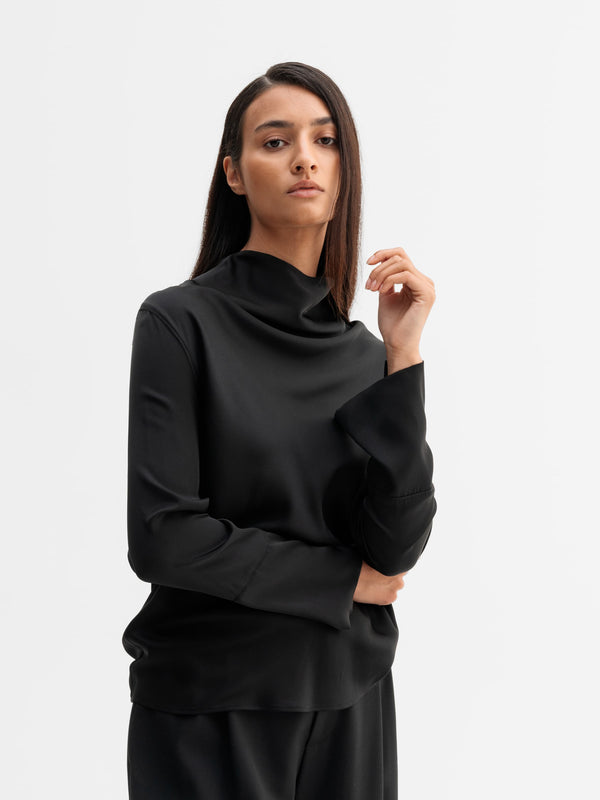Model wearing Ahlvar Gallery Ayumi silk blouse in Black