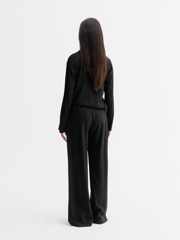 Back view of Ahlvar Gallery Ayumi silk blouse in Black