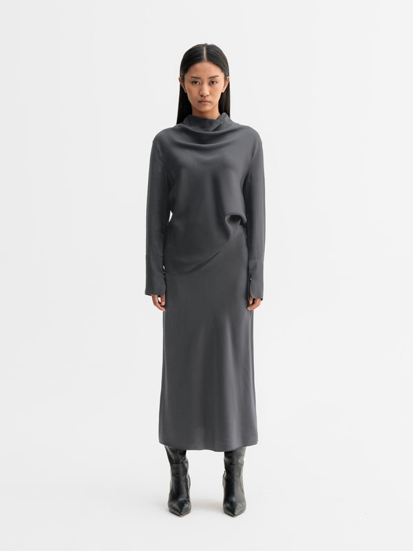 Model wearing Ahlvar Gallery Ayumi silk blouse in Dark grey