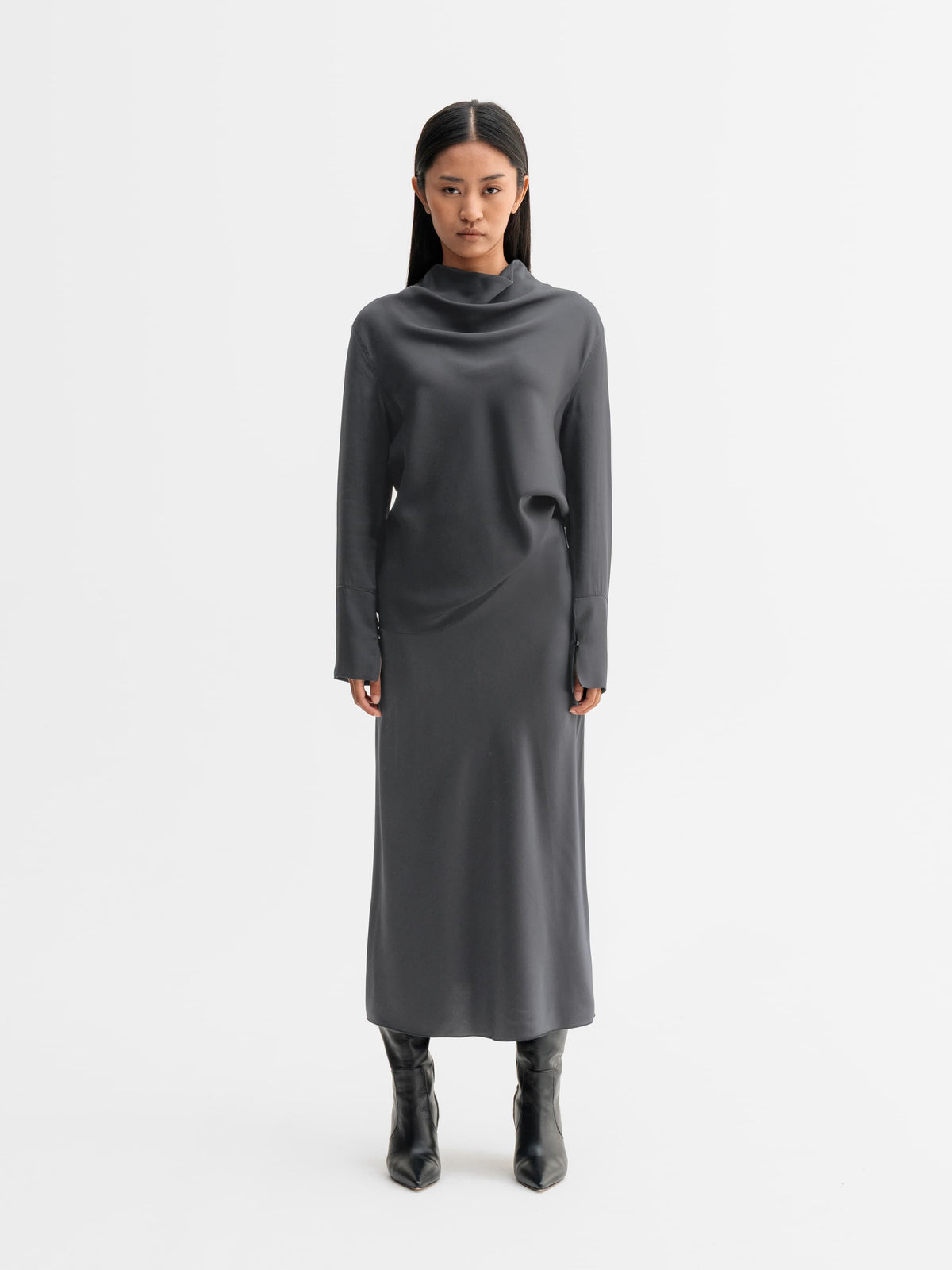Model wearing Ahlvar Gallery Ayumi silk blouse in Dark grey