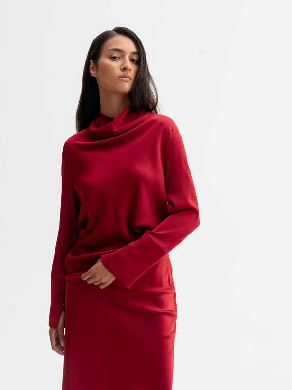Model wearing Ahlvar Gallery Ayumi silk blouse in Dark red