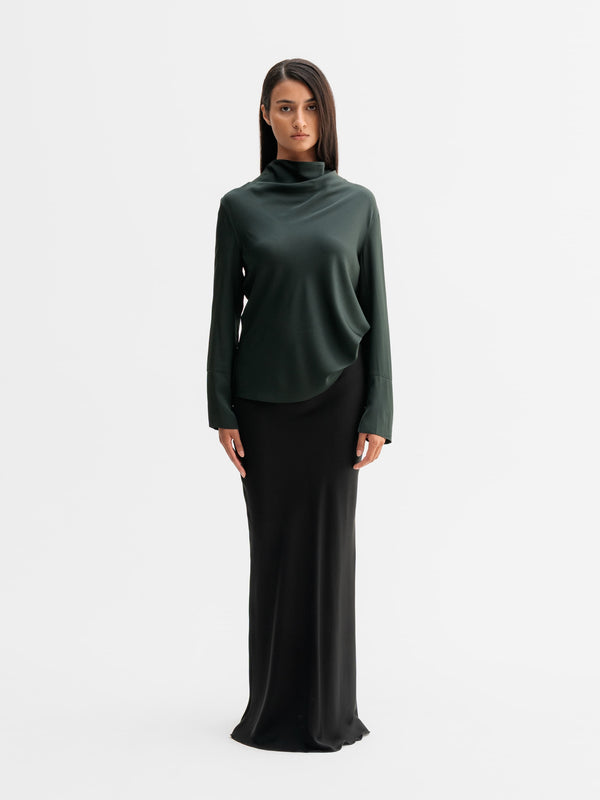 Model wearing Ahlvar Gallery Ayumi silk blouse in Deep forest