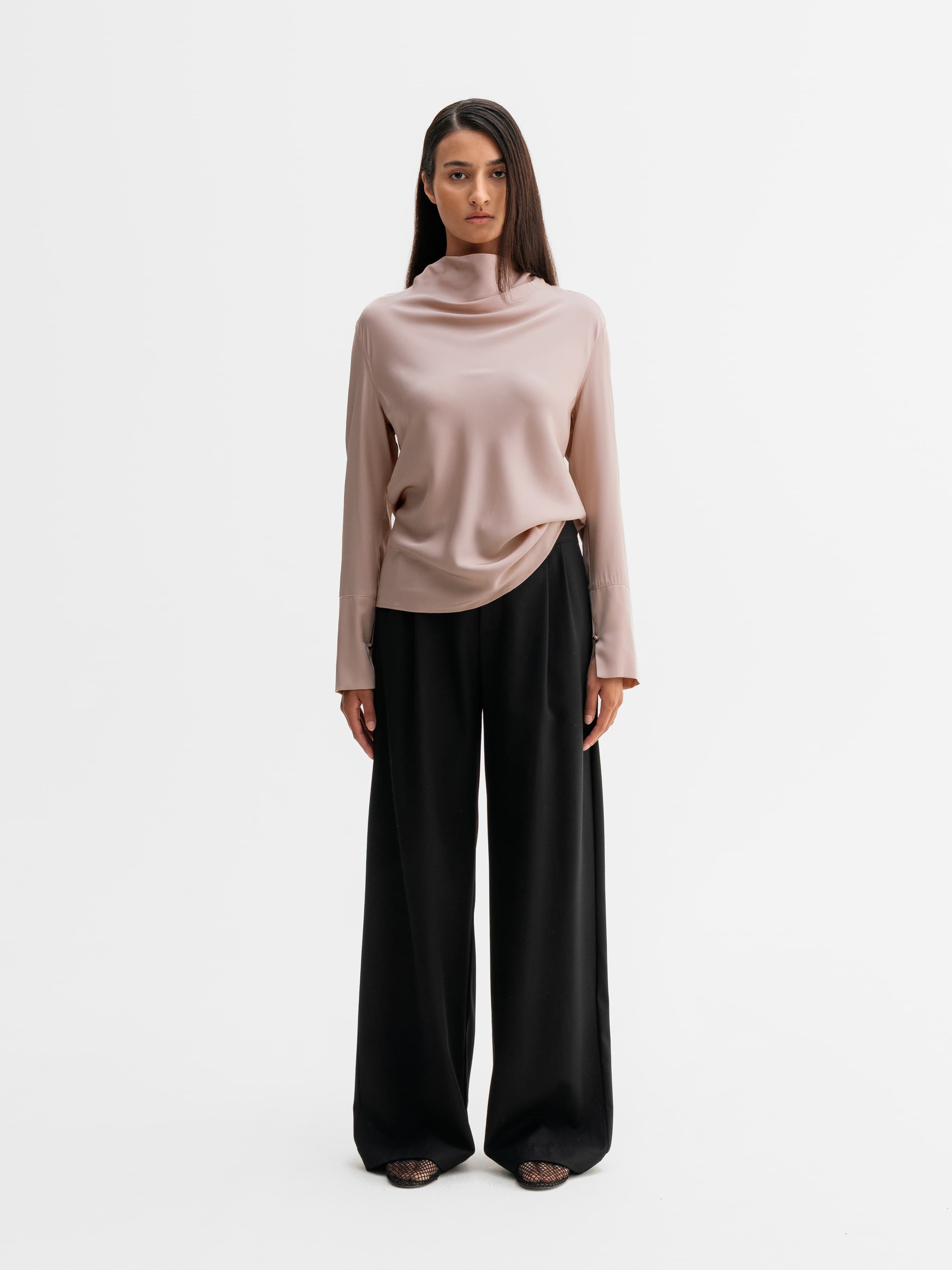 Model wearing Ahlvar Gallery Ayumi silk blouse in Dusty pink