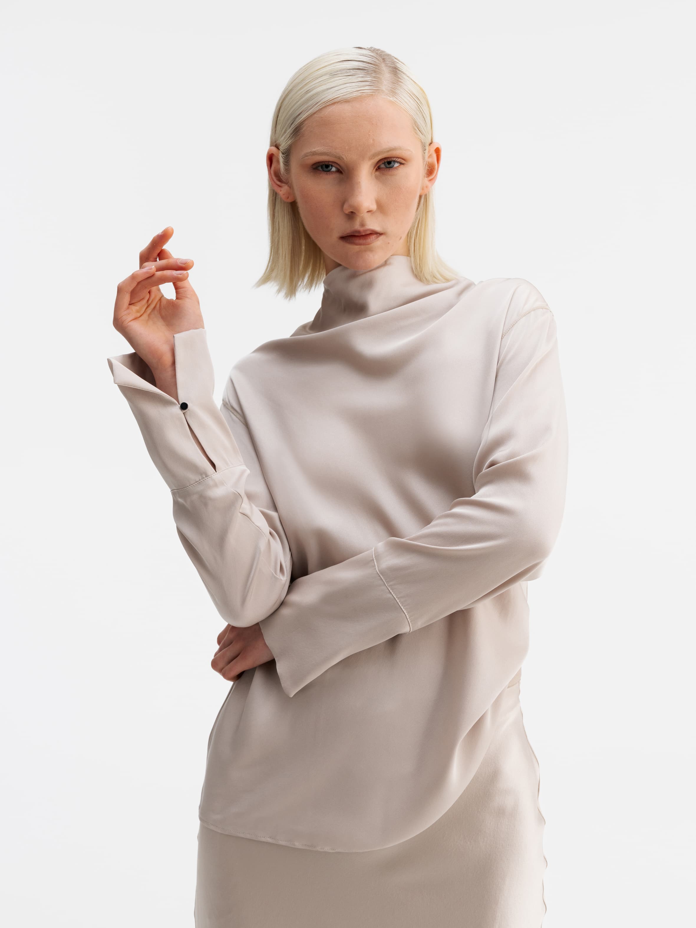 Model wearing Ahlvar Gallery Ayumi silk blouse greige