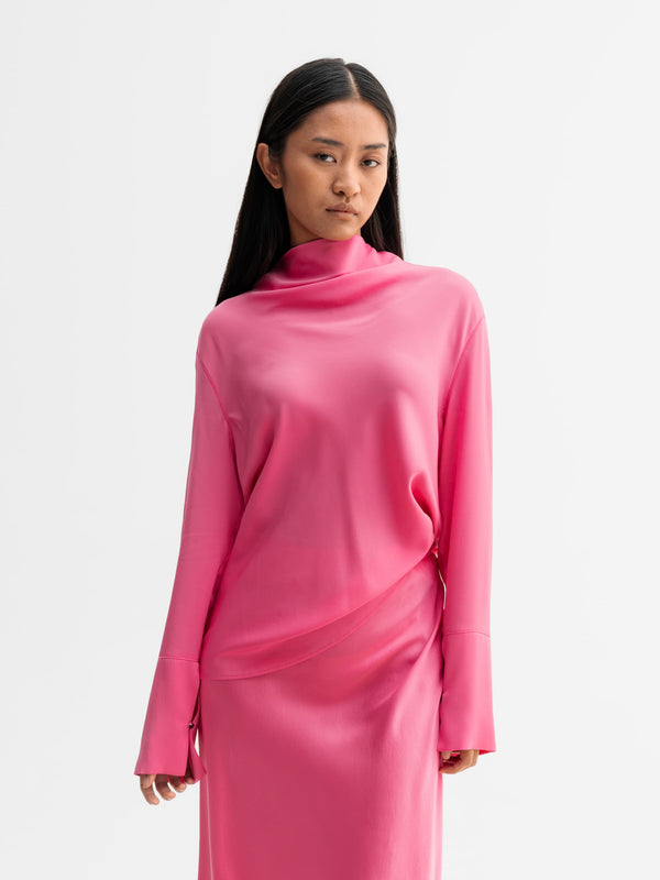 Model wearing Ahlvar Gallery Ayumi silk blouse in Pink