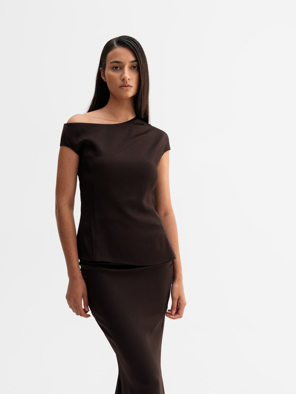 Model wearing Ahlvar Gallery Chika top in Dark brown