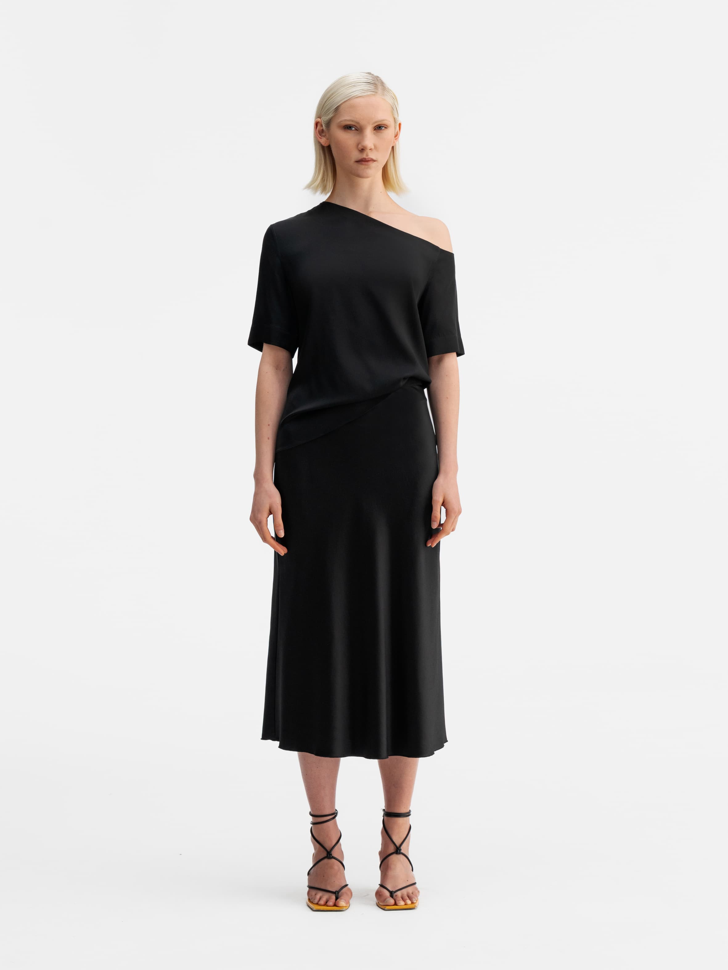 Model wearing Ahlvar Gallery Chima silk blouse black