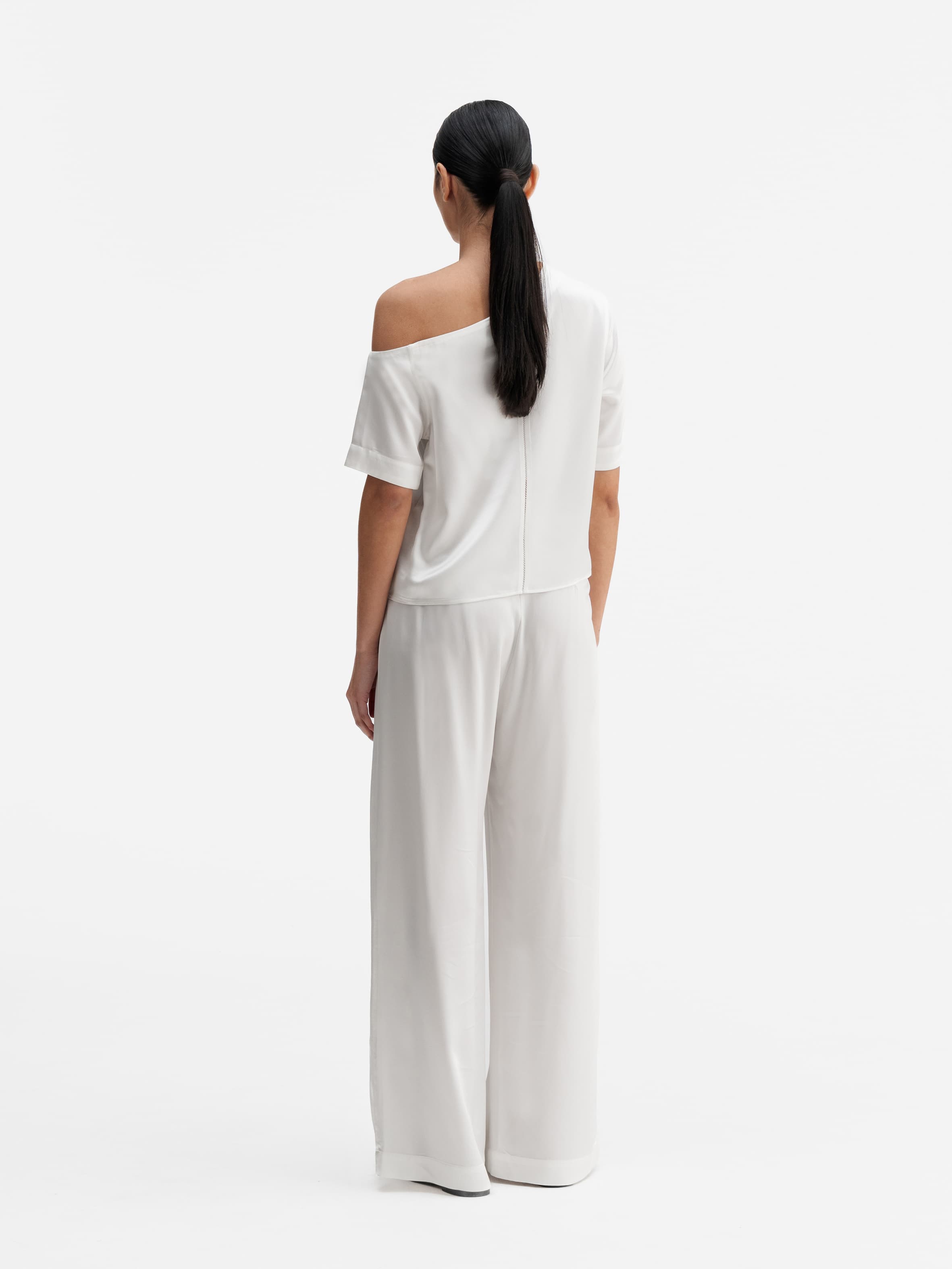 Back view of Ahlvar Gallery Chima cropped heavy satin blouse white
