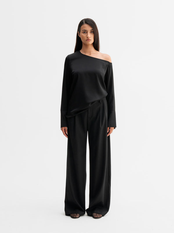 Model wearing Ahlvar Gallery Chiney silk blouse in Black