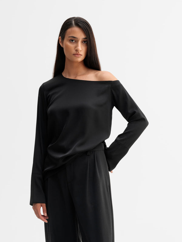 Model wearing Ahlvar Gallery Chiney silk blouse in Black