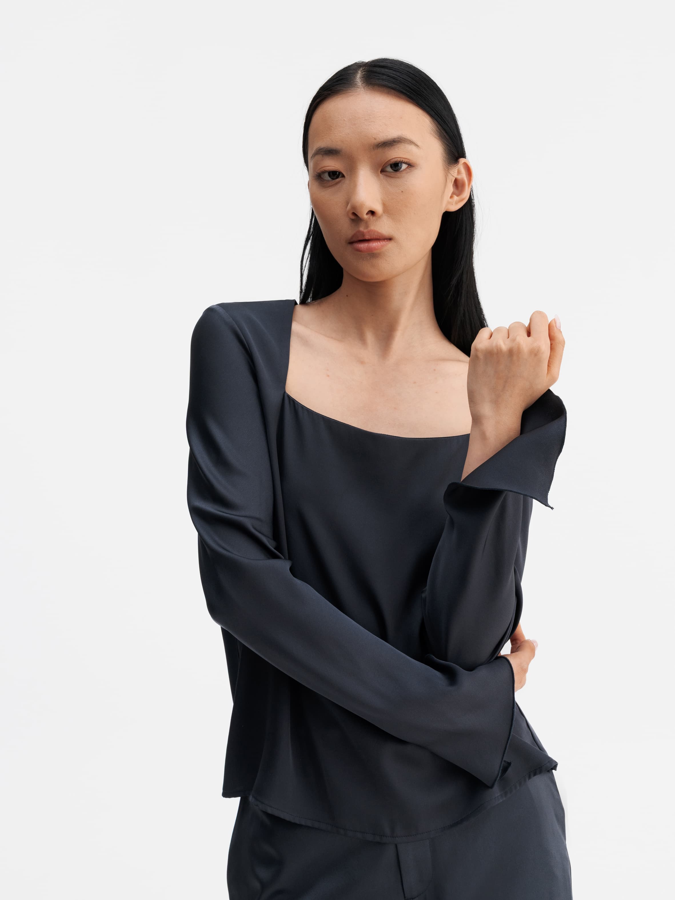 Model wearing Ahlvar Gallery Della silk blouse blue grey