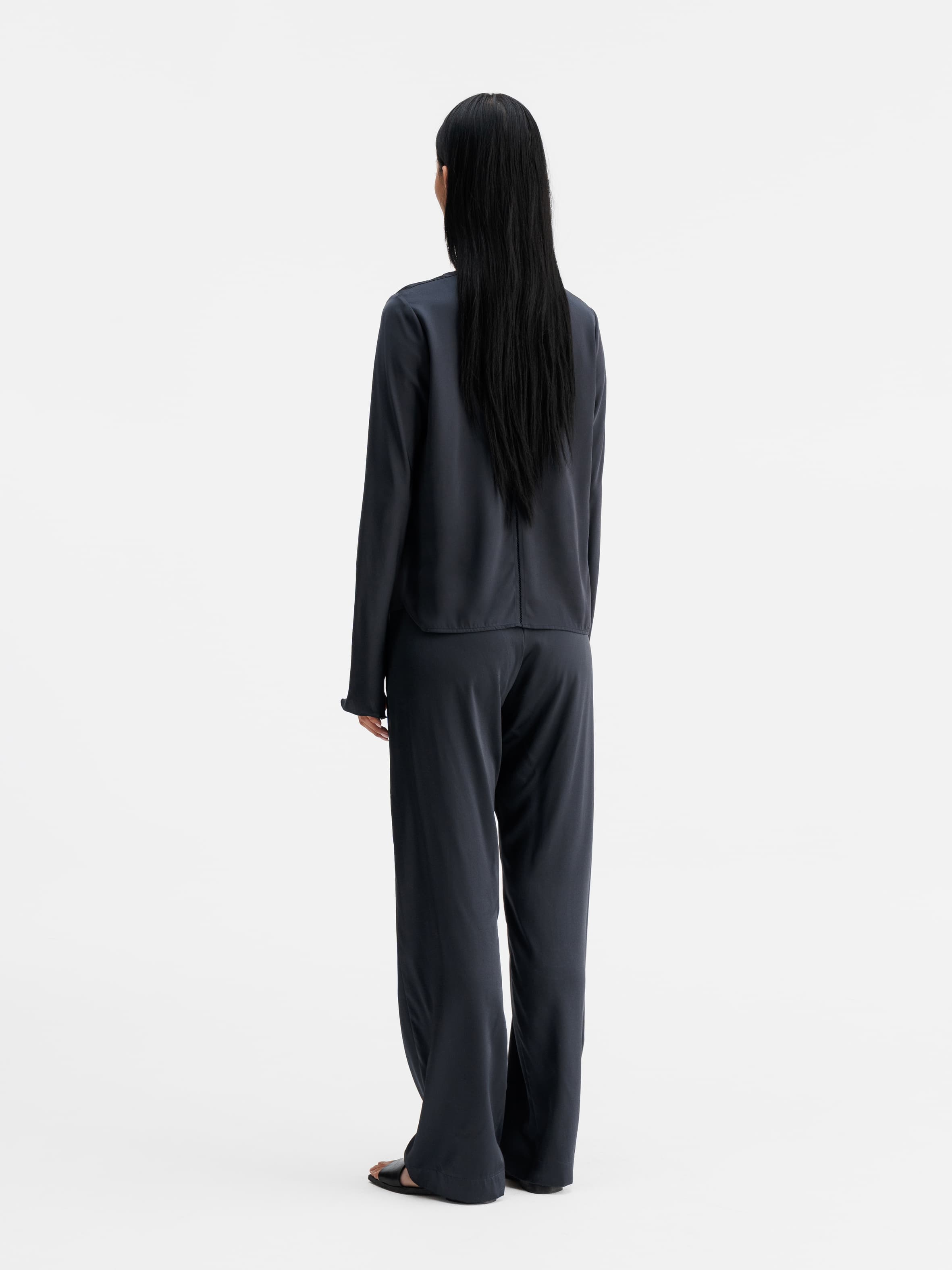 Back view of Ahlvar Gallery Della silk blouse blue grey