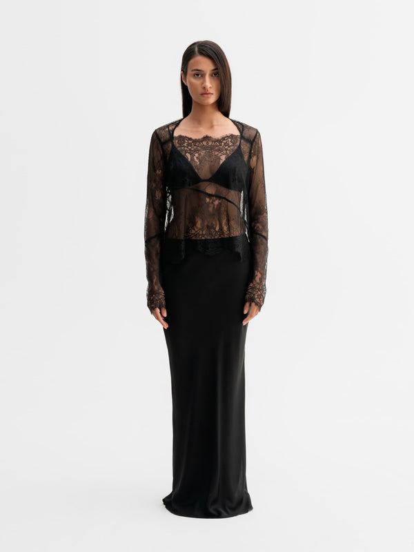 Model wearing Ahlvar Gallery Della lace blouse in Black
