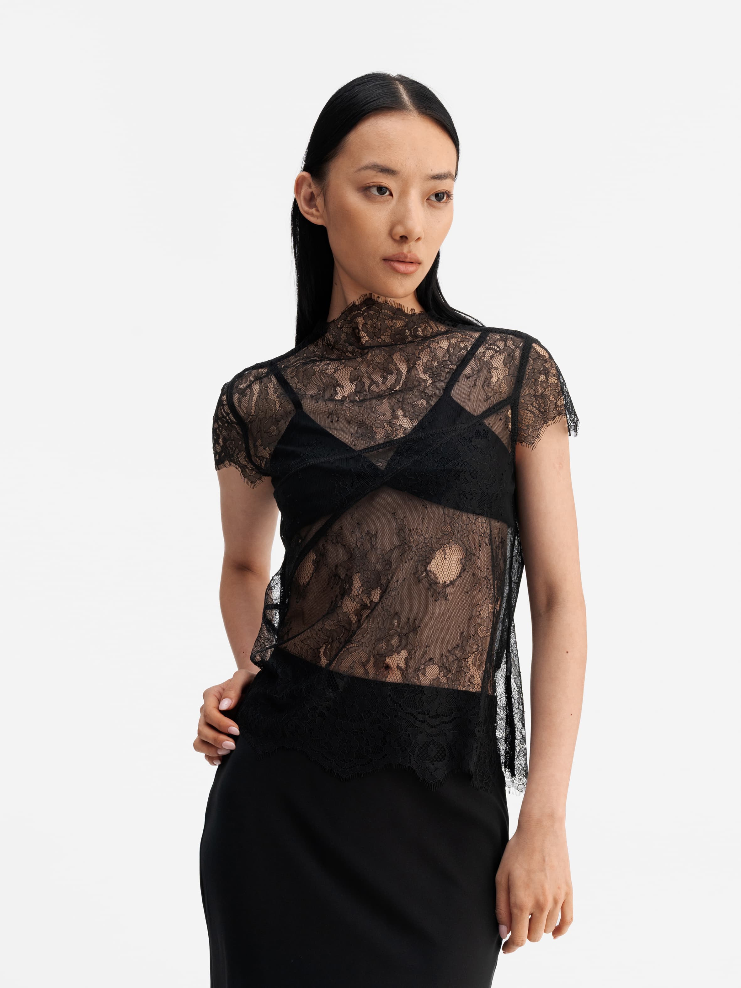 Model wearing Ahlvar Gallery Eden lace top black