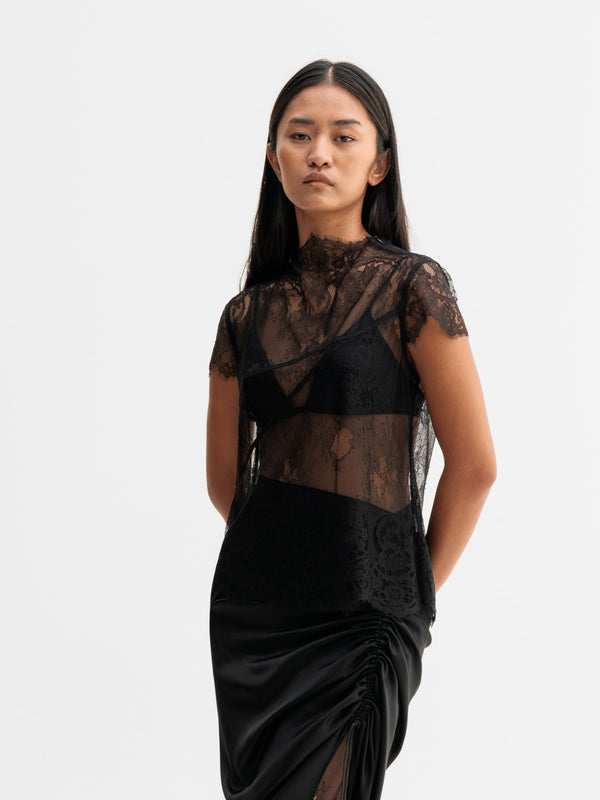 Model wearing Ahlvar Gallery Eden lace top in Black
