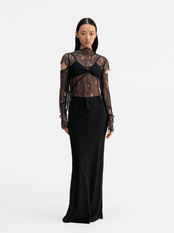 Model wearing Ahlvar Gallery Edina lace blouse black