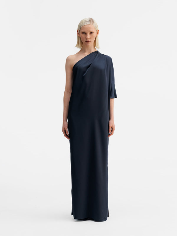 Model wearing Ahlvar Gallery Ella satin dress blue grey