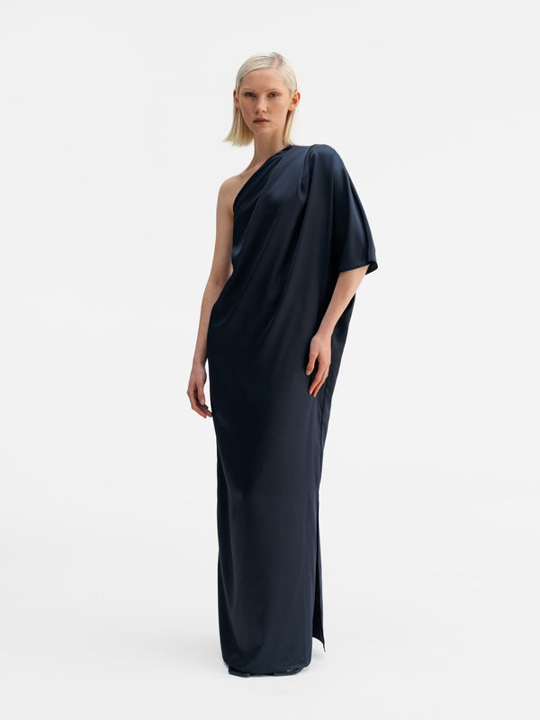 Model wearing Ahlvar Gallery Ella satin dress blue grey