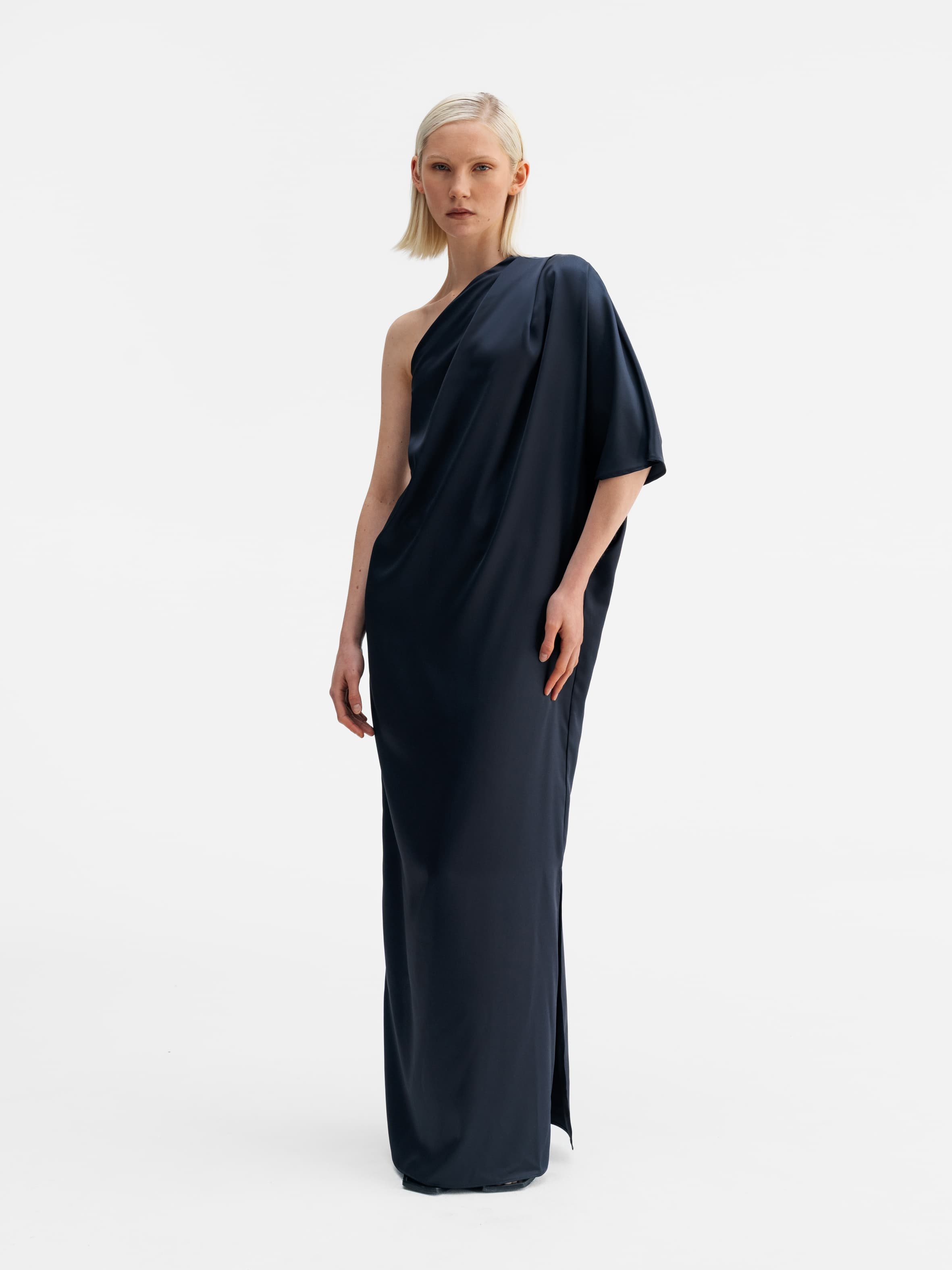 Model wearing Ahlvar Gallery Ella satin dress blue grey