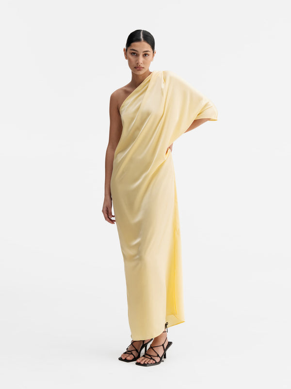 Model wearing Ahlvar Gallery Ella satin dress light yellow