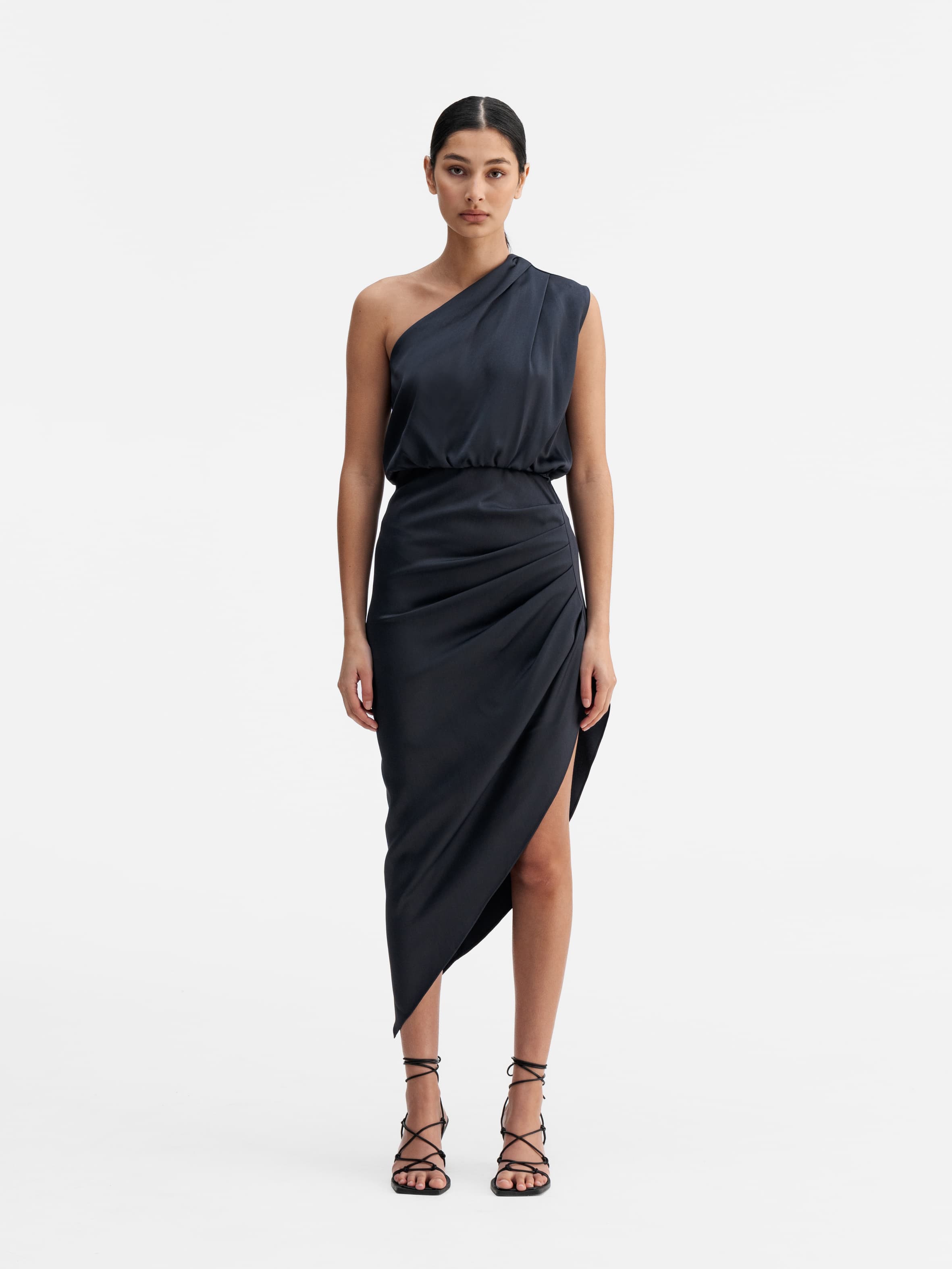 Model wearing Ahlvar Gallery Elle dress blue grey
