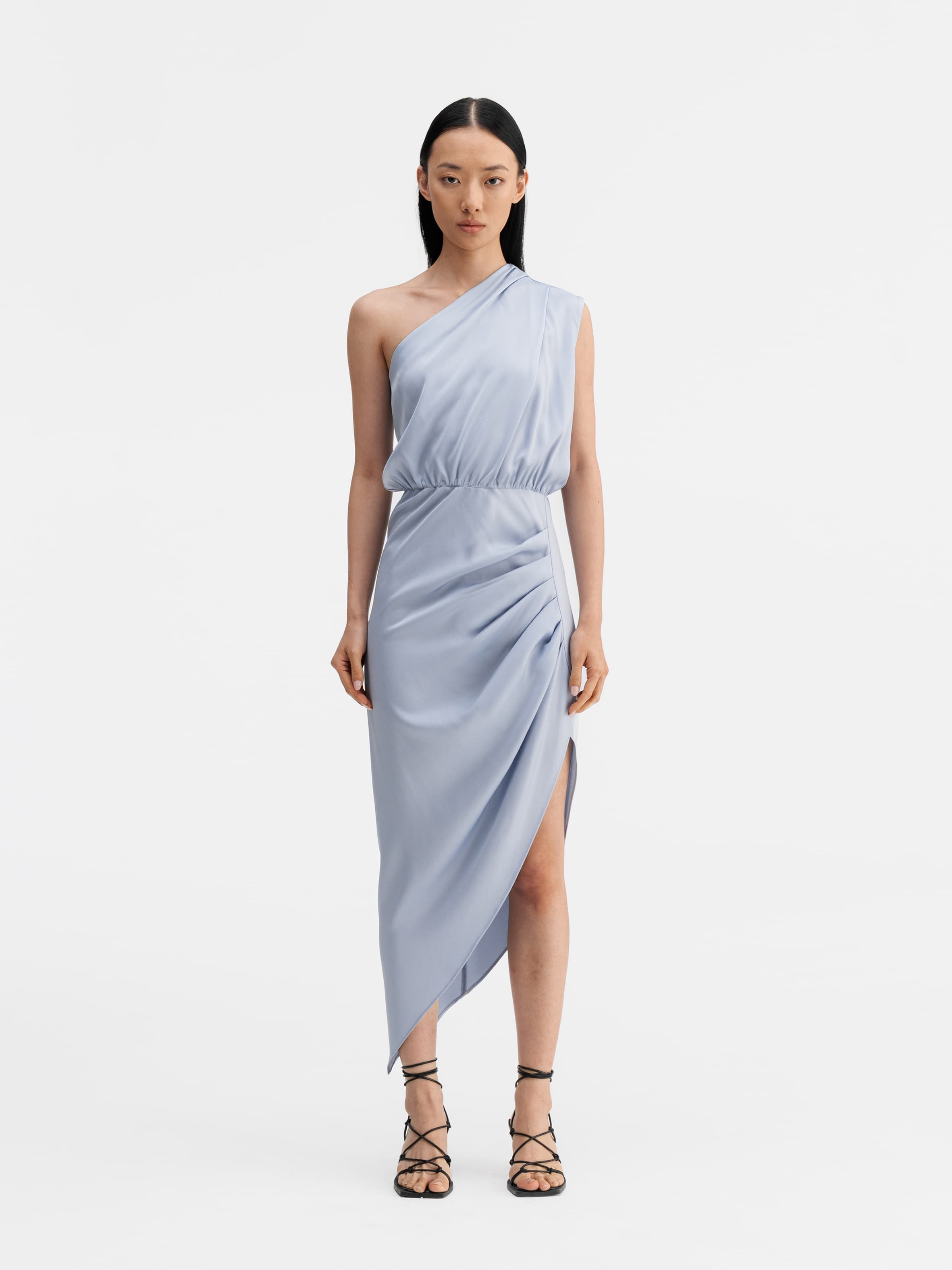 Model wearing Ahlvar Gallery Elle dress denim blue