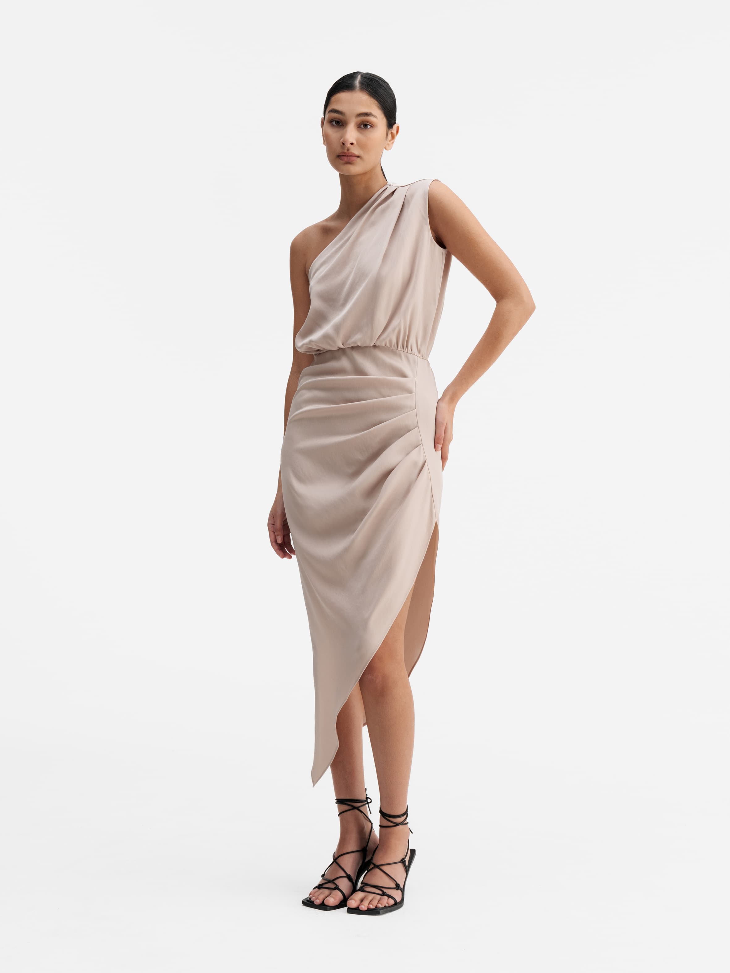Model wearing Ahlvar Gallery Elle dress greige