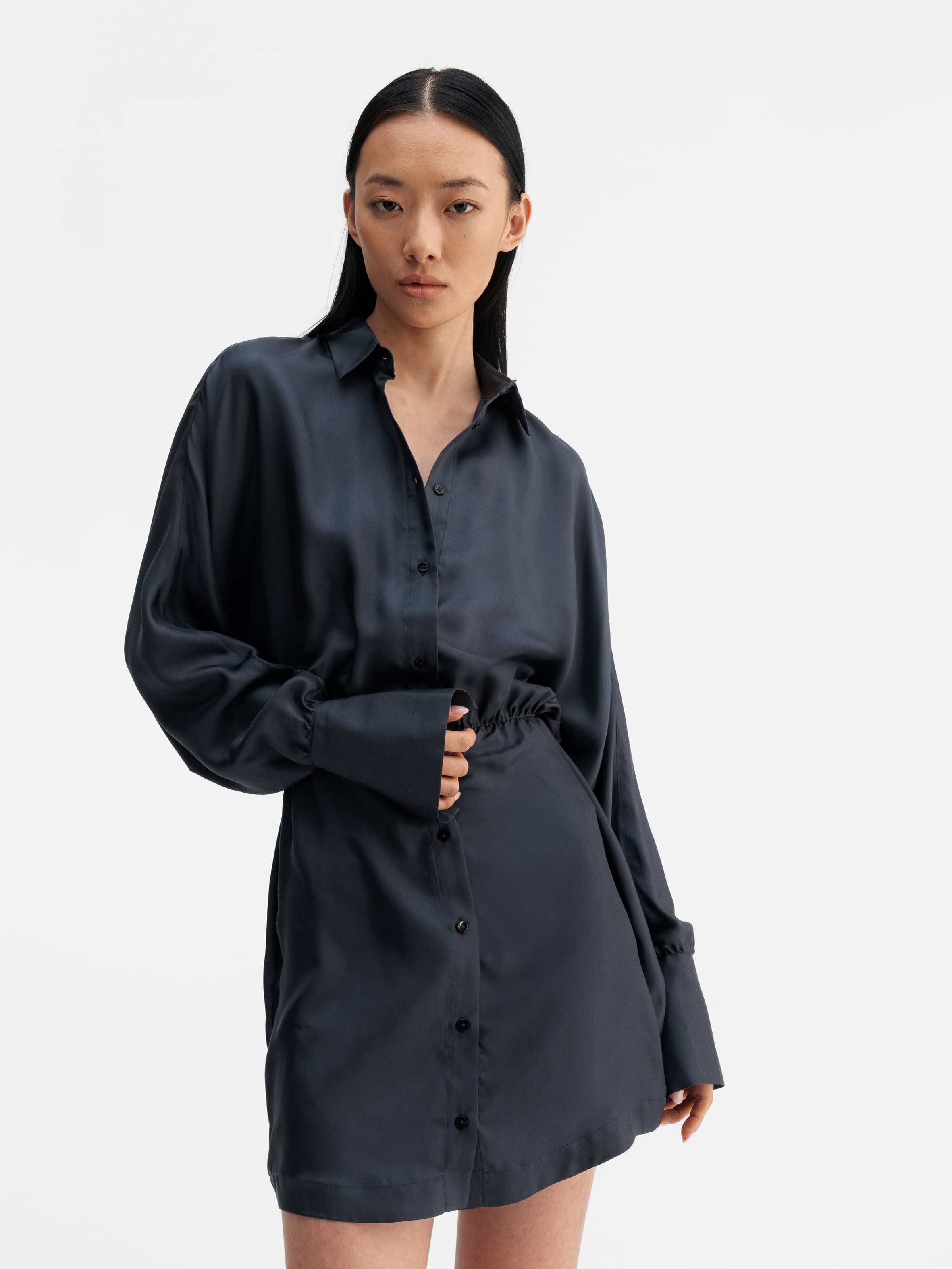 Model wearing Ahlvar Gallery Gia silk twill shirt dress blue grey