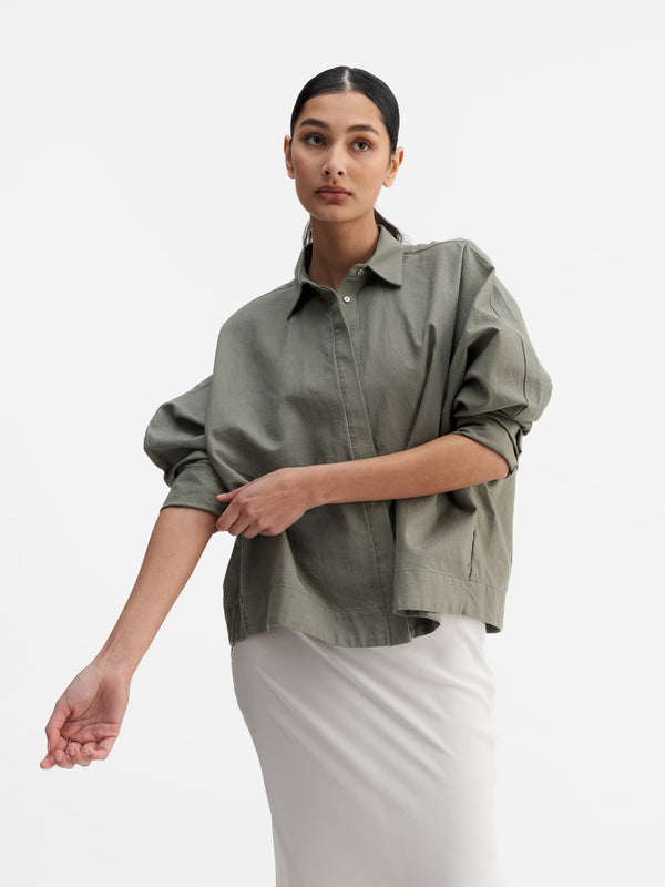 Model wearing Ahlvar Gallery Gigi oxford shirt light military