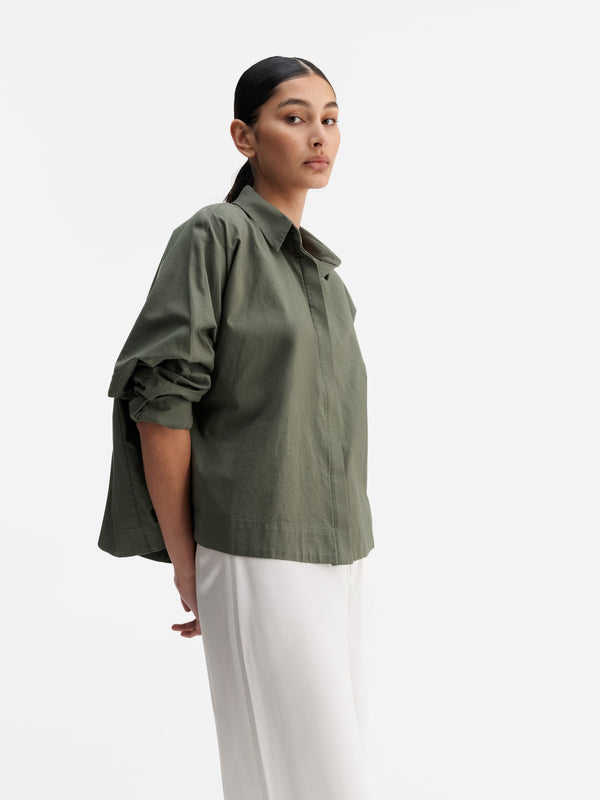 Model wearing Ahlvar Gallery Gigi oxford shirt olive green