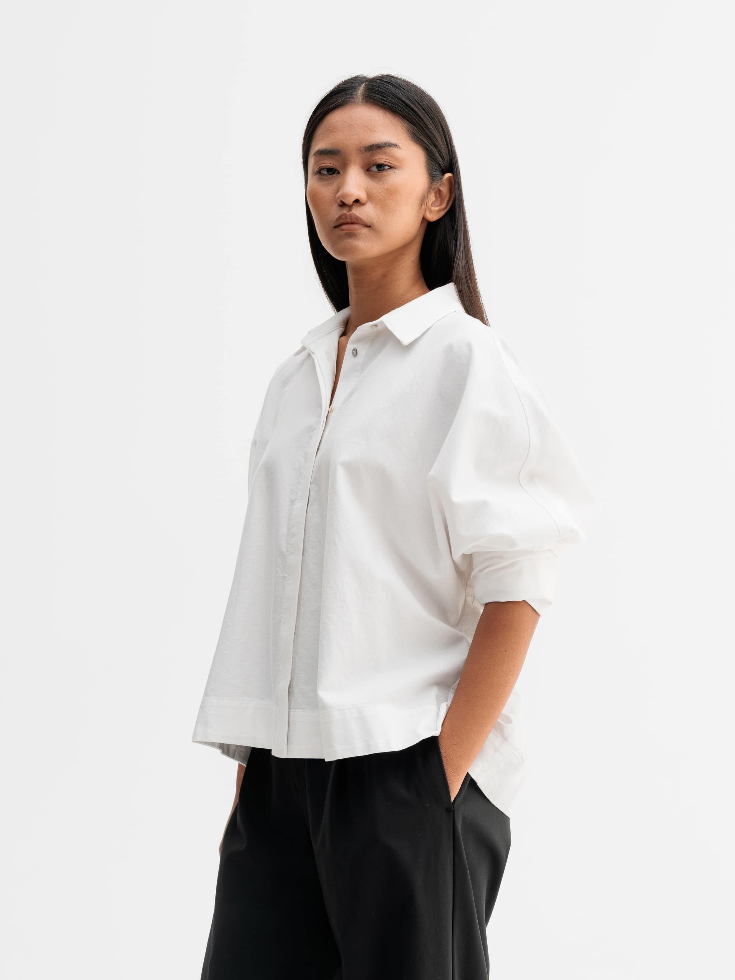 Model wearing Ahlvar Gallery Gigi oxford shirt in White