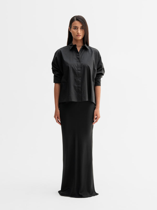 Model wearing Ahlvar Gallery Gigi shirt in Black