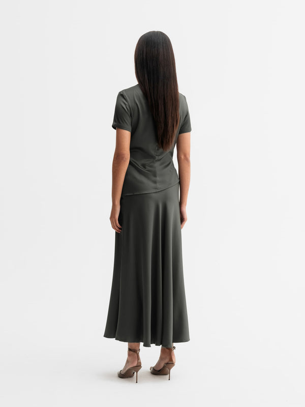 Back view of Ahlvar Gallery Hadi satin skirt in Wood