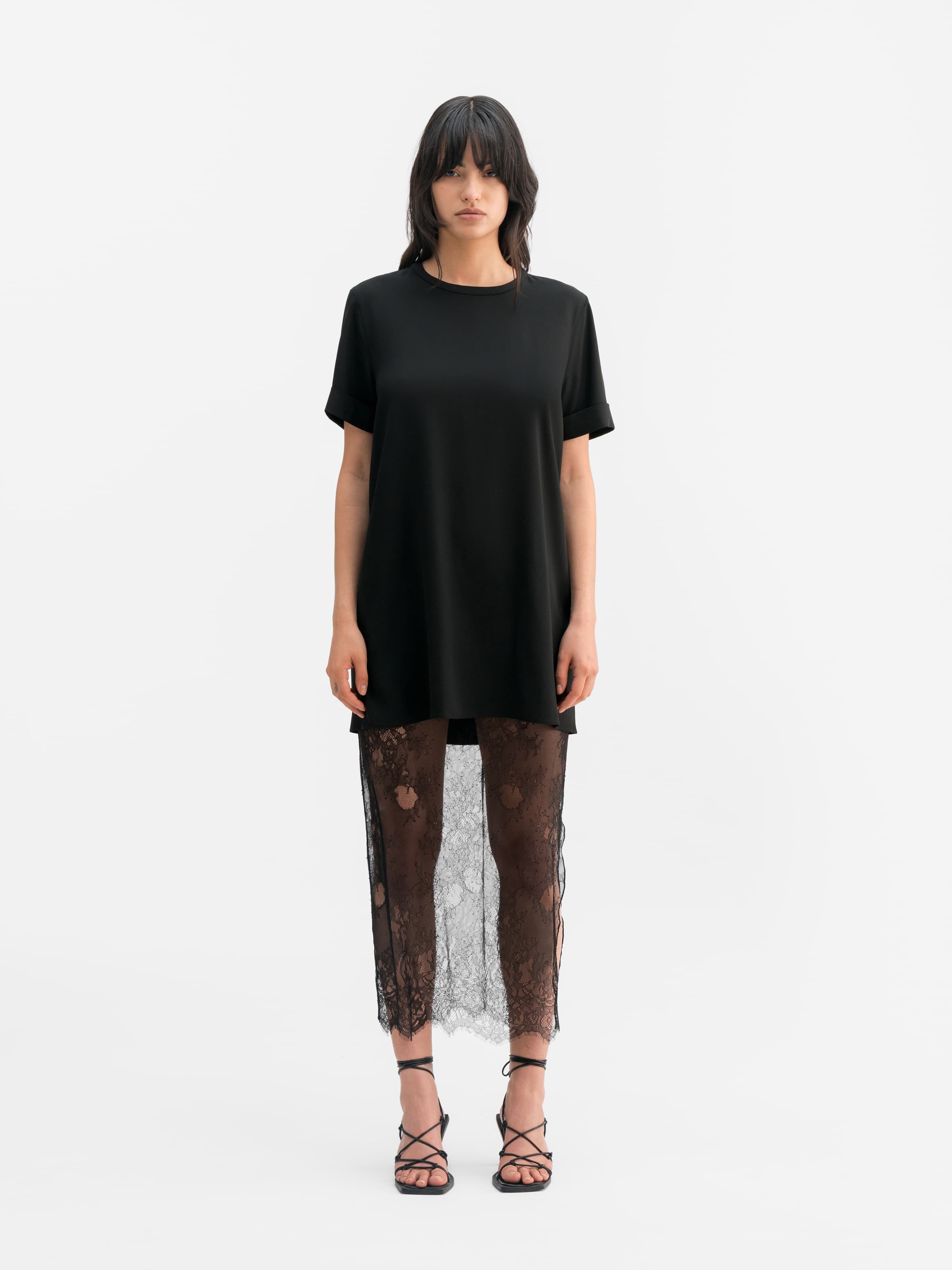Model wearing Ahlvar Gallery Hana lace pencil skirt black