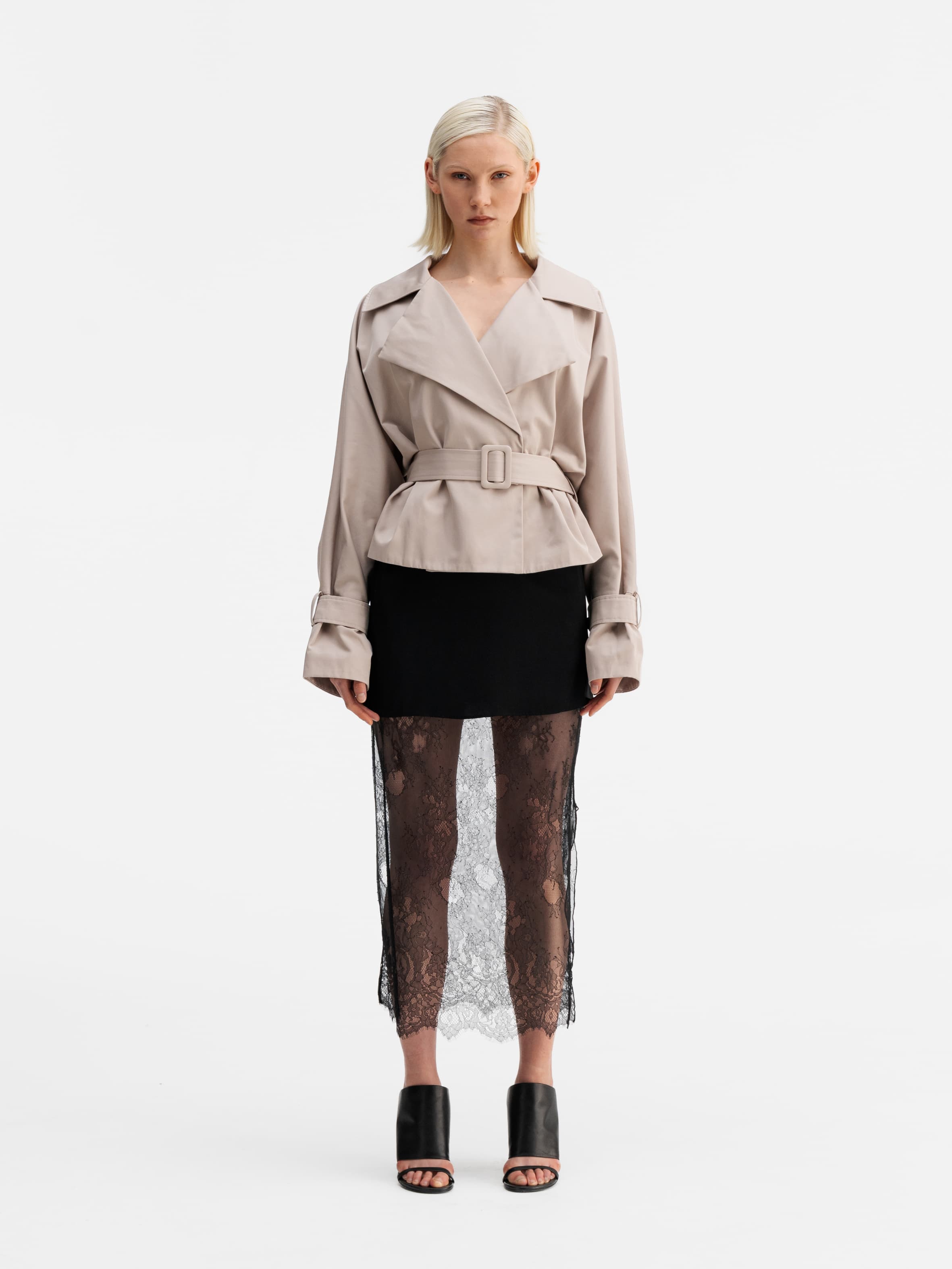 Model wearing Ahlvar Gallery Hana lace pencil skirt black