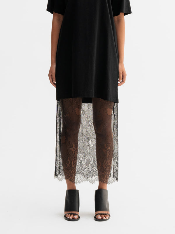 Model wearing Ahlvar Gallery Hana lace pencil skirt in Black