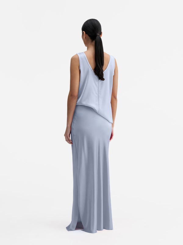 Back view of Ahlvar Gallery Hana long logo satin skirt denim blue
