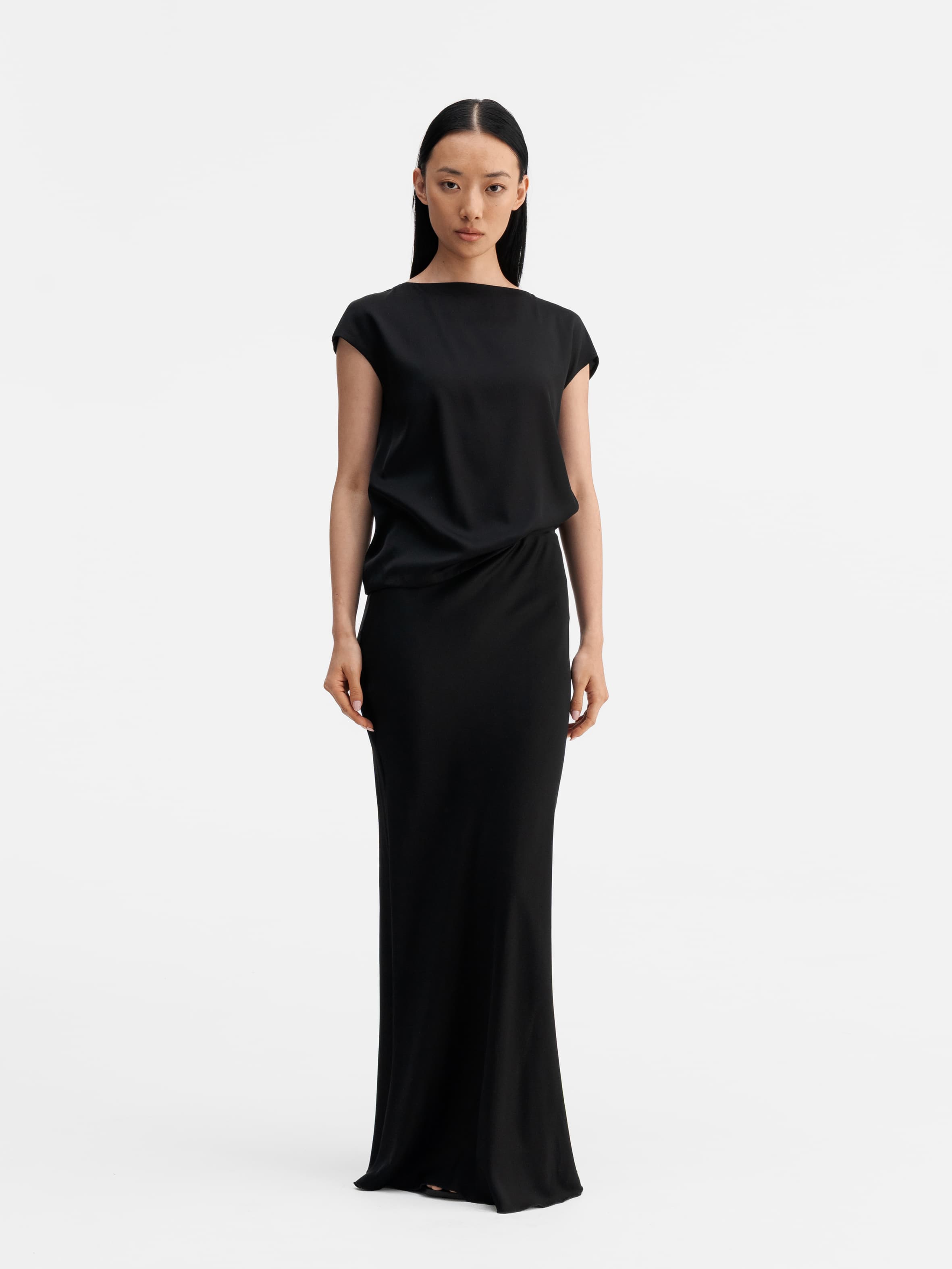 Model wearing Ahlvar Gallery Hana long silk skirt black