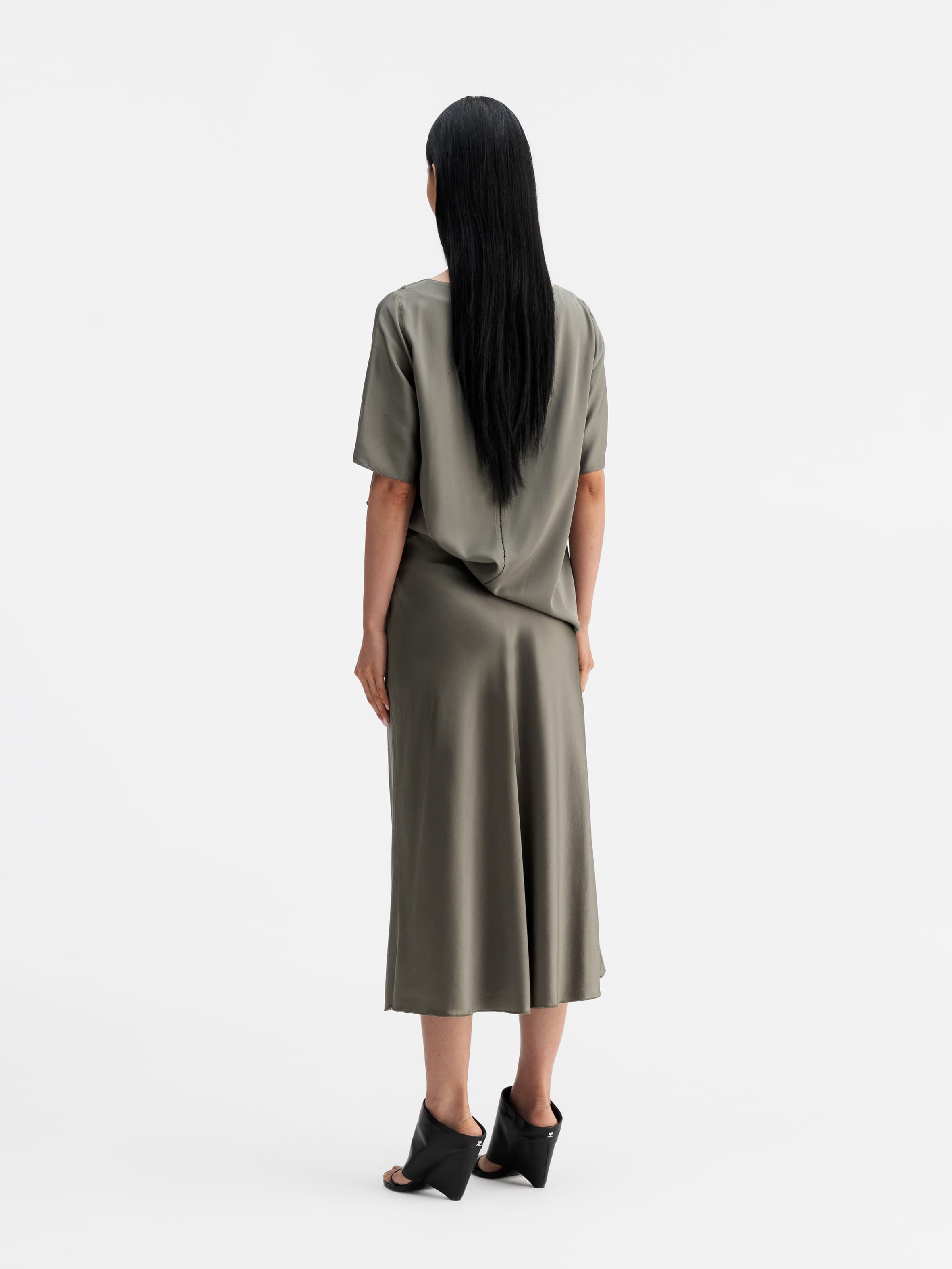 Back view of Ahlvar Gallery Hana satin silk skirt light military