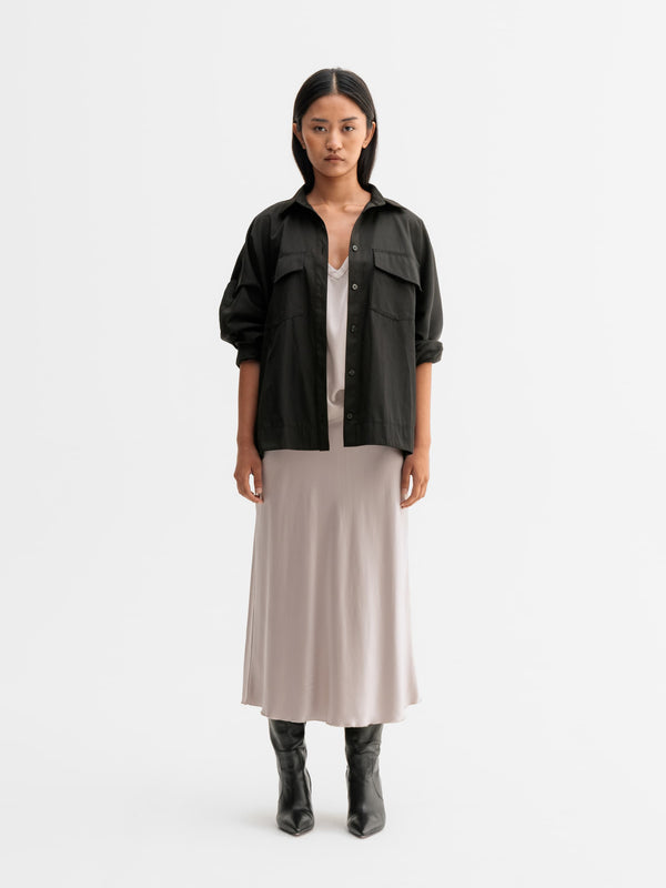 Model wearing Ahlvar Gallery Kaia over shirt in Black
