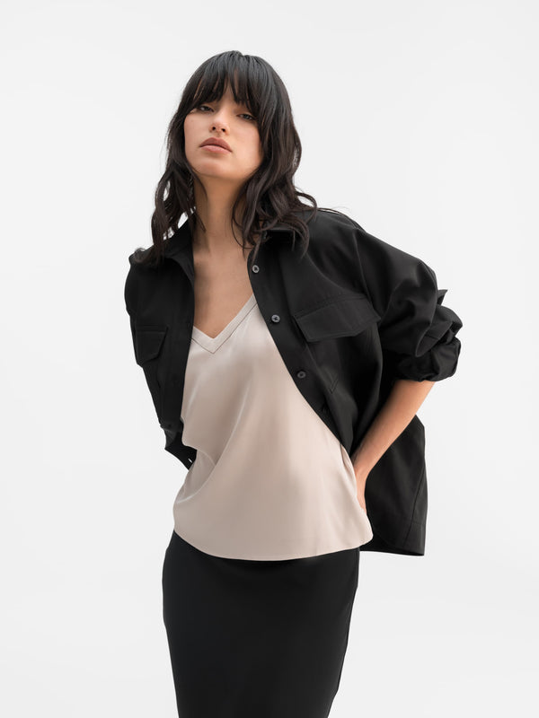 Model wearing Ahlvar Gallery Kaia over shirt in Black