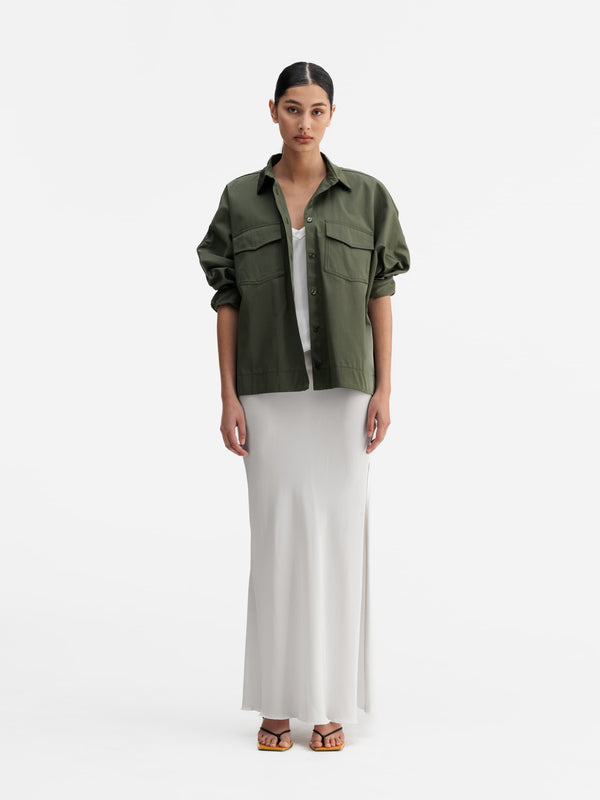 Model wearing Ahlvar Gallery Kaia over shirt olive green