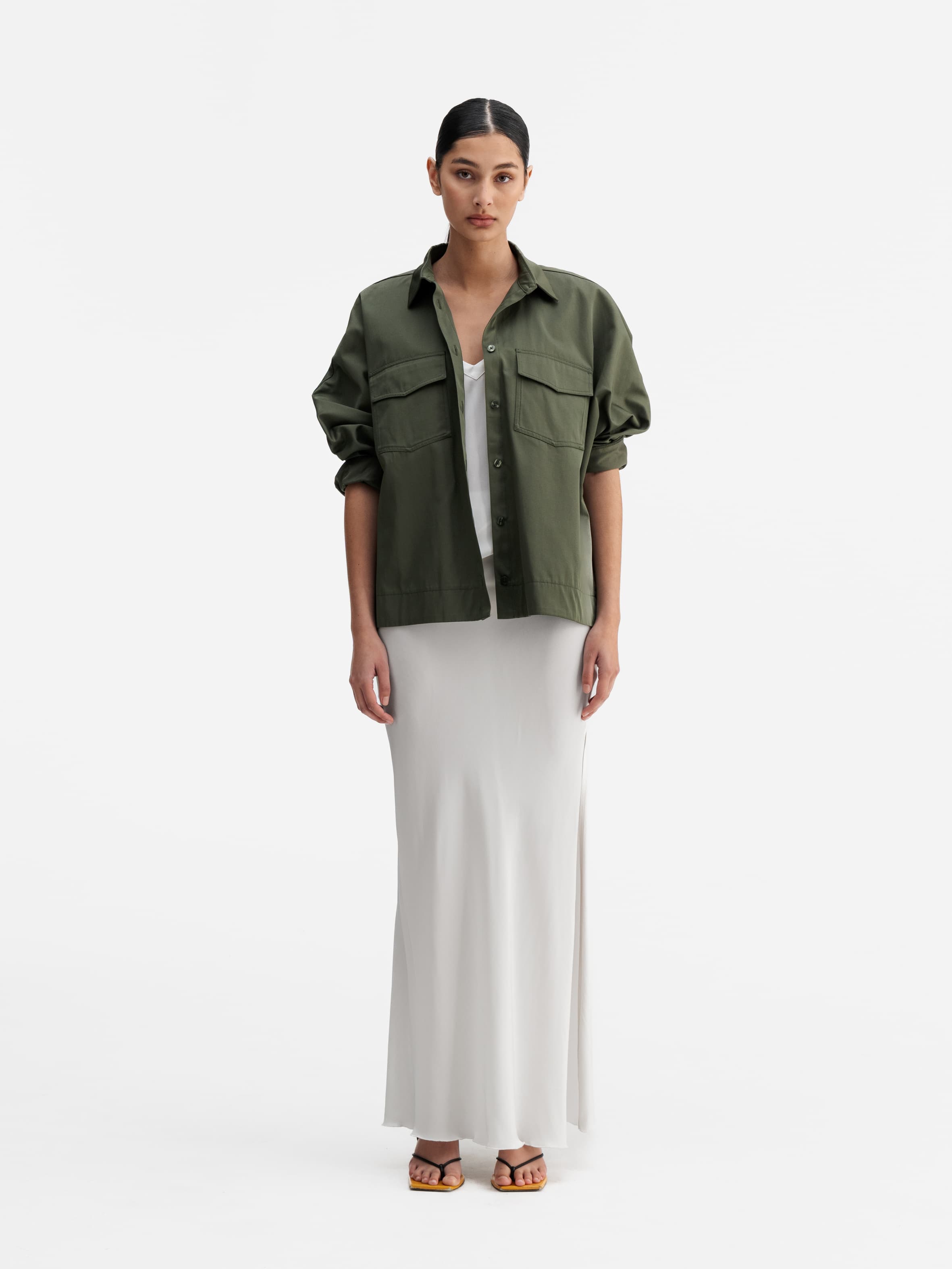 Model wearing Ahlvar Gallery Kaia over shirt olive green