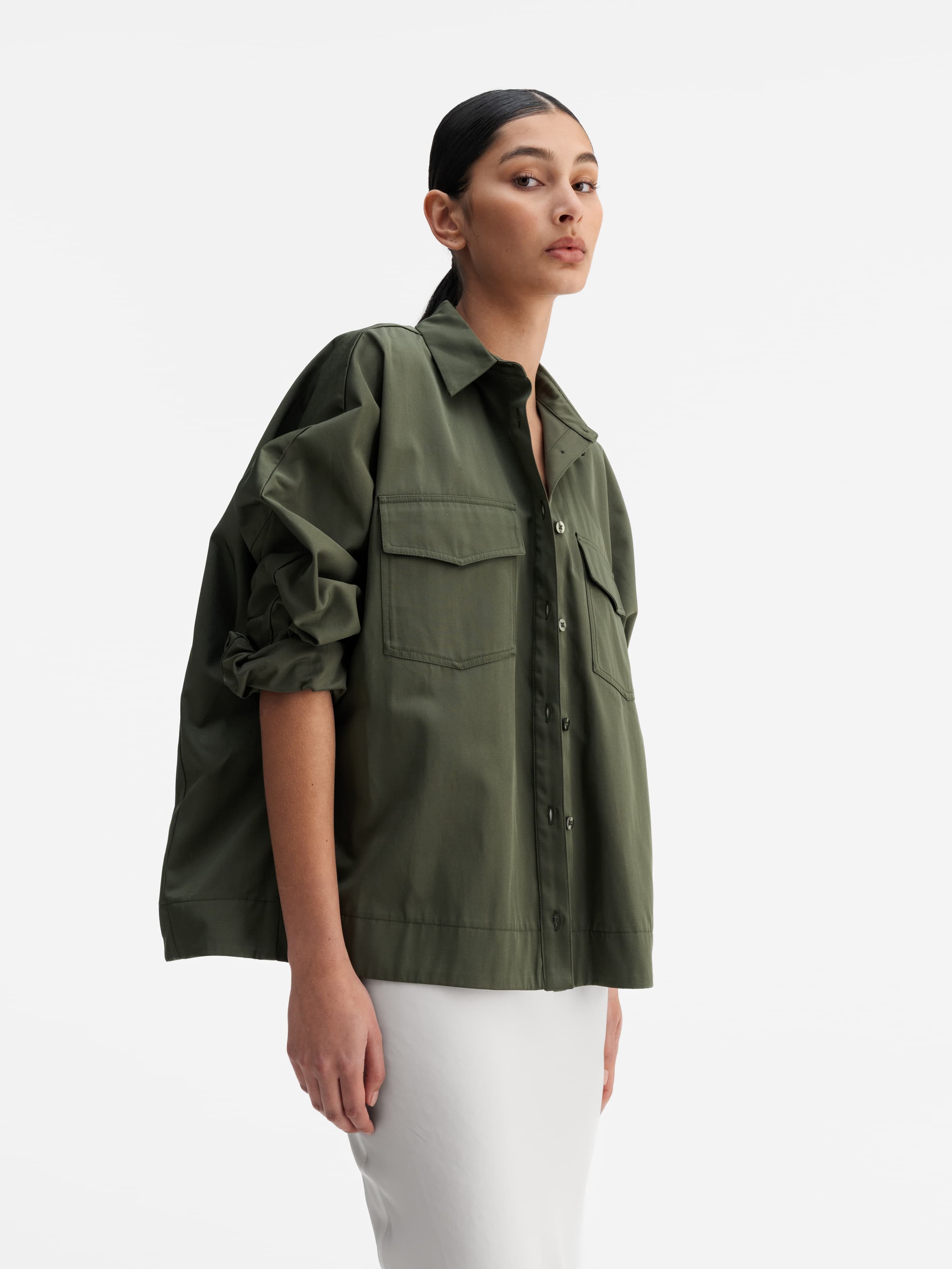 Model wearing Ahlvar Gallery Kaia over shirt olive green