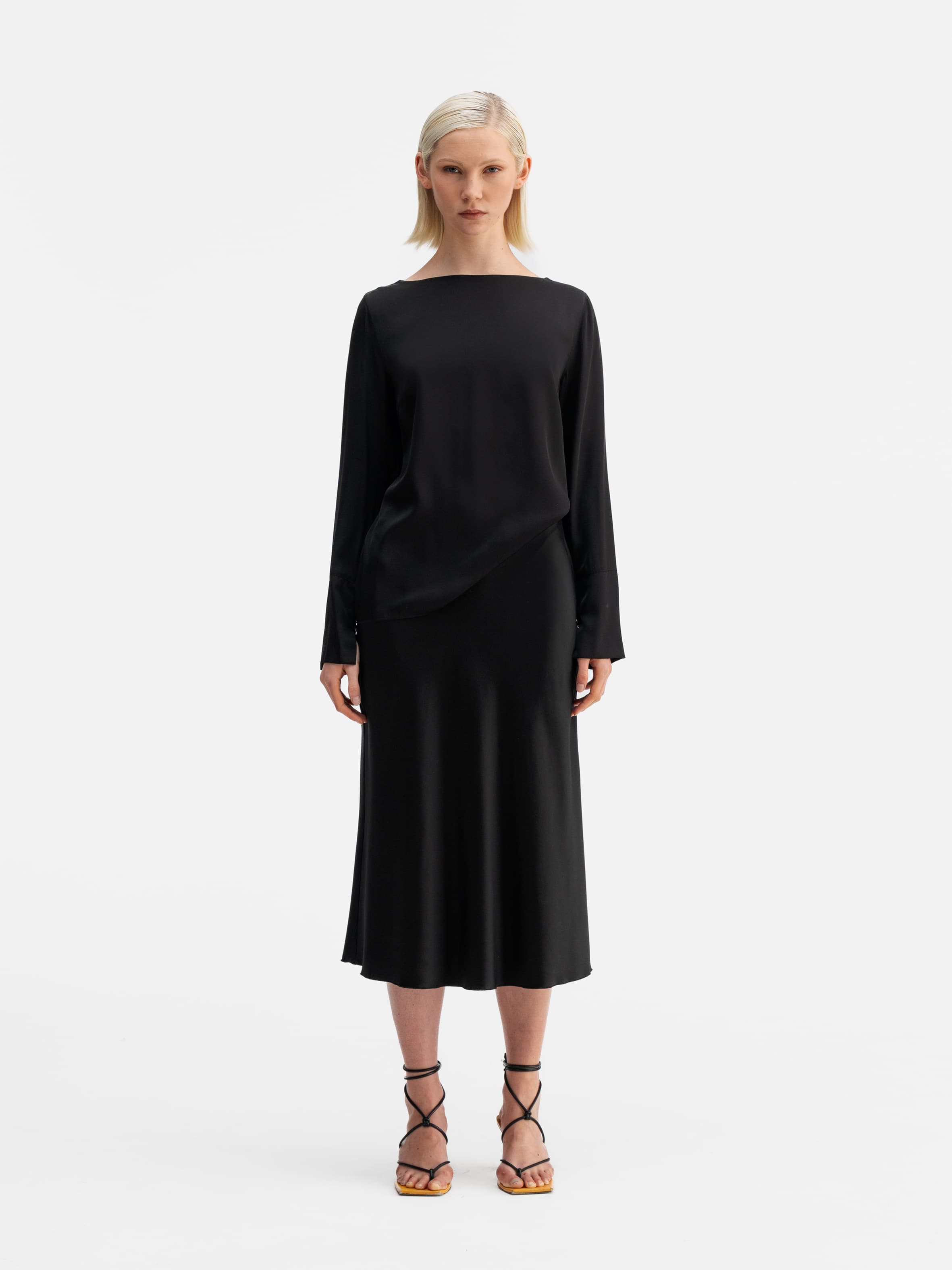 Model wearing Ahlvar Gallery Kelly silk blouse black