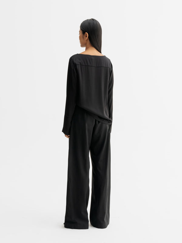 Back view of Ahlvar Gallery Kelly silk blouse in Black
