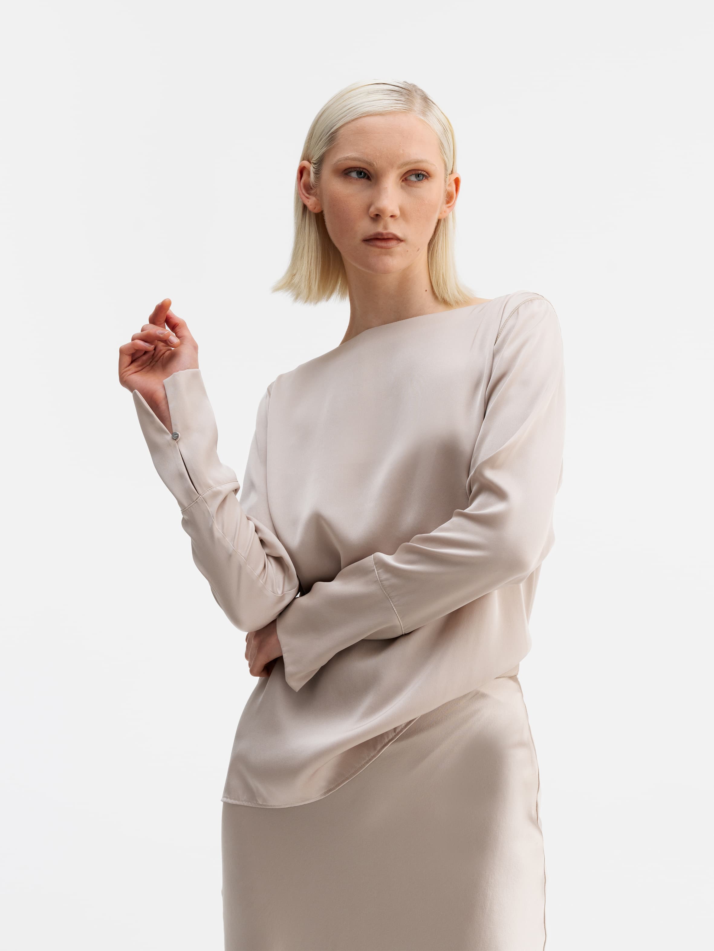 Model wearing Ahlvar Gallery Kelly silk blouse greige